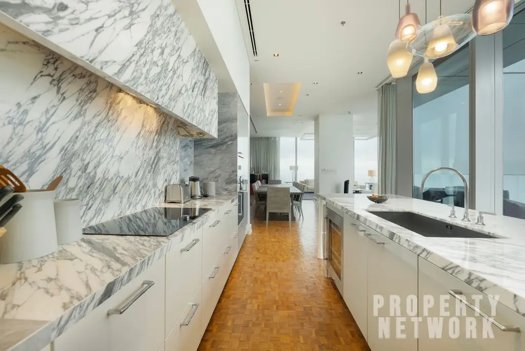 Discover luxury living at The Ritz-Carlton Residences, a 4-bedroom, 4-bathroom condo on the 58th floor, offering 486 sqm of elegance for sale at 350M THB. near BTS Chong Nonsi and near MRT Sam Yan