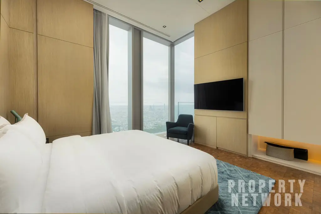 Discover luxury living at The Ritz-Carlton Residences, a 4-bedroom, 4-bathroom condo on the 58th floor, offering 486 sqm of elegance for sale at 350M THB. near BTS Chong Nonsi and near MRT Sam Yan