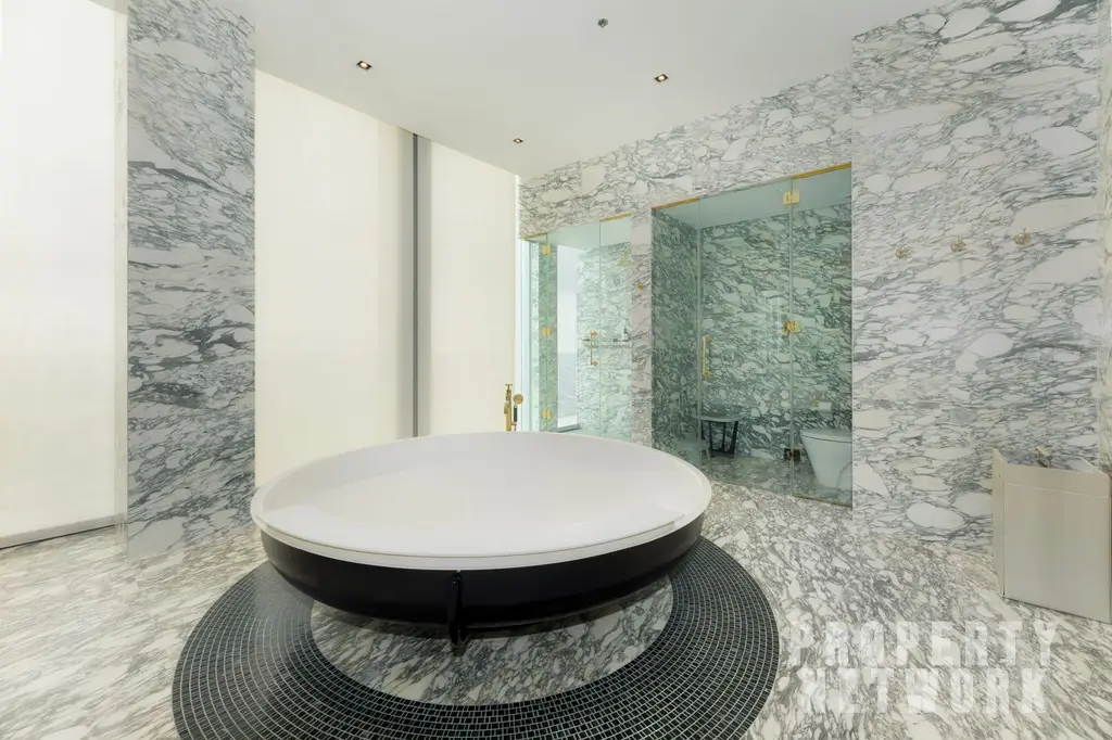 Discover luxury living at The Ritz-Carlton Residences, a 4-bedroom, 4-bathroom condo on the 58th floor, offering 486 sqm of elegance for sale at 350M THB. near BTS Chong Nonsi and near MRT Sam Yan