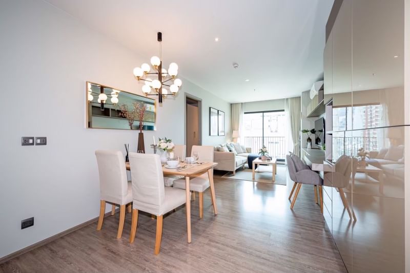Rent a luxurious 2-bedroom 2-bathroom condo at Rhythm Ekkamai. Stunning 21st-floor views, 80 sqm, fully furnished, near BTS Ekkamai. Rent: 75,000 THB/month.