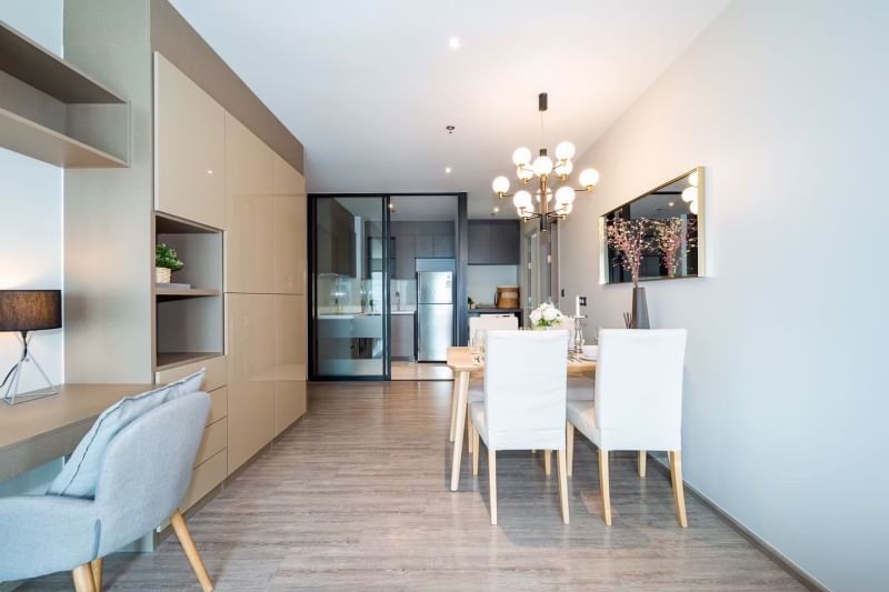 Rent a luxurious 2-bedroom 2-bathroom condo at Rhythm Ekkamai. Stunning 21st-floor views, 80 sqm, fully furnished, near BTS Ekkamai. Rent: 75,000 THB/month.