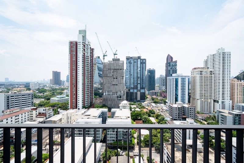 Rent a luxurious 2-bedroom 2-bathroom condo at Rhythm Ekkamai. Stunning 21st-floor views, 80 sqm, fully furnished, near BTS Ekkamai. Rent: 75,000 THB/month.