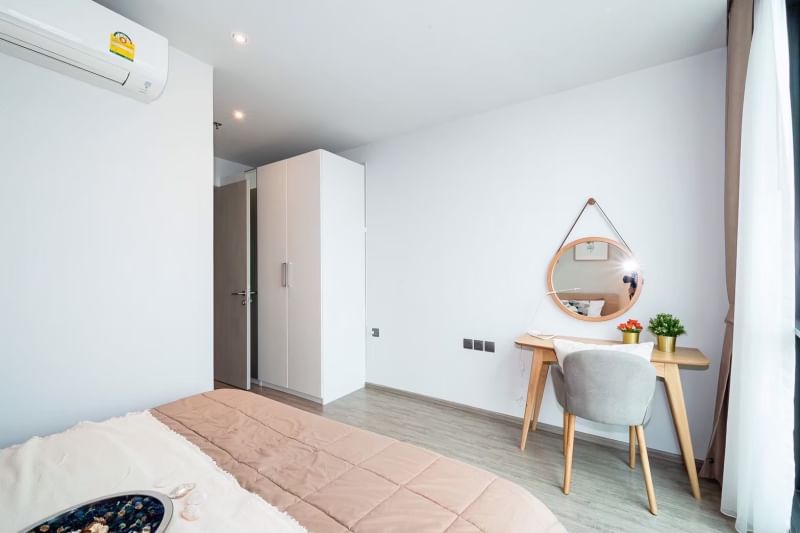 Rent a luxurious 2-bedroom 2-bathroom condo at Rhythm Ekkamai. Stunning 21st-floor views, 80 sqm, fully furnished, near BTS Ekkamai. Rent: 75,000 THB/month.