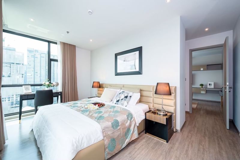 Rent a luxurious 2-bedroom 2-bathroom condo at Rhythm Ekkamai. Stunning 21st-floor views, 80 sqm, fully furnished, near BTS Ekkamai. Rent: 75,000 THB/month.