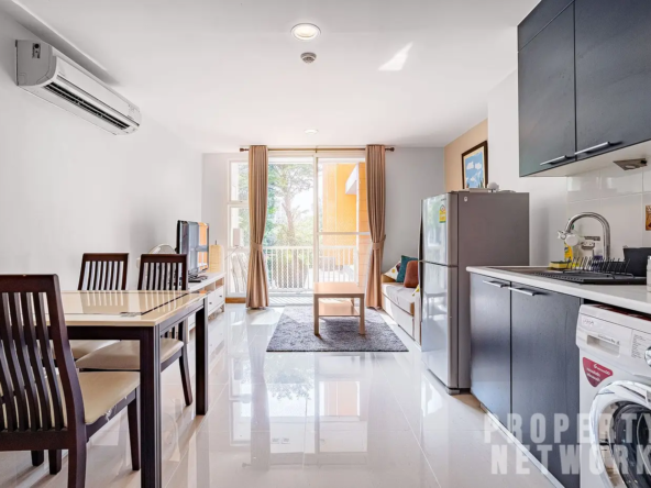 Spacious 2-bedroom, 2-bathroom condo at D 65 Condominium, 67.8 sqm, fully furnished with a balcony, modern kitchen, and amenities near BTS Ekkamai.