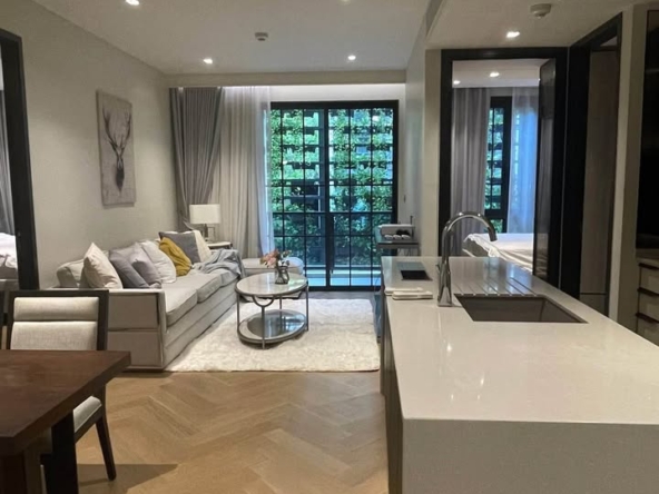 2-BR Condo at The Reserve Sukhumvit 61, 75 sqm, low floor, near BTS Ekkamai. Rent: 75,000 THB/month. Fully furnished with luxury amenities.
