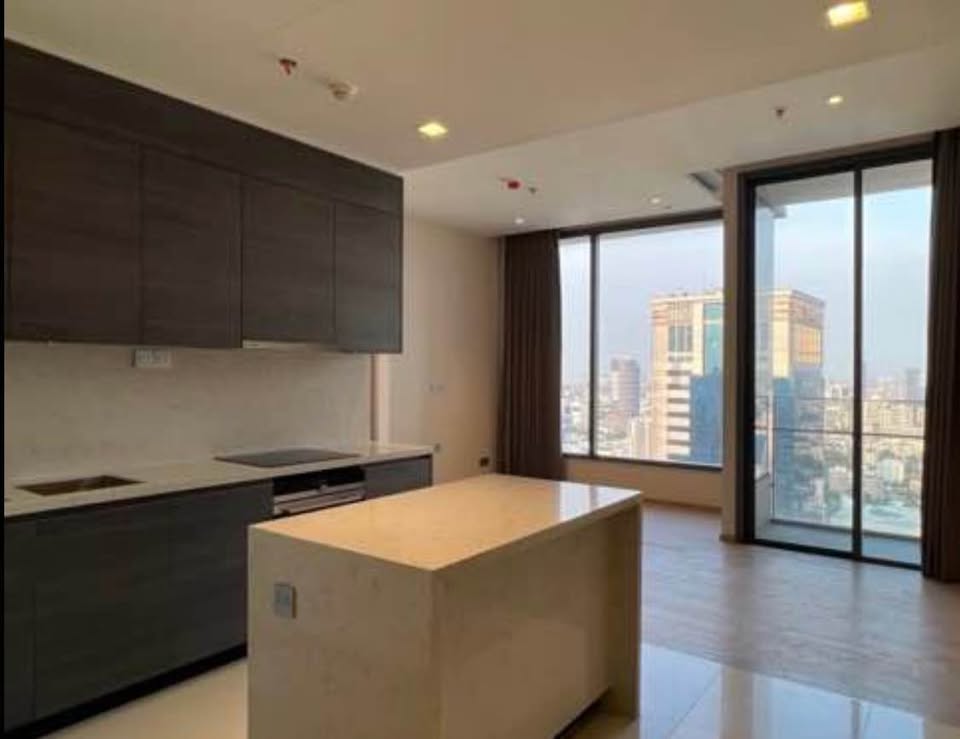 Discover luxury living at The Esse Asoke with this 2-bedroom, 2-bathroom corner condo for sale. High floor, 75.5 sqm, fully furnished. Sale for 20,000,000 THB