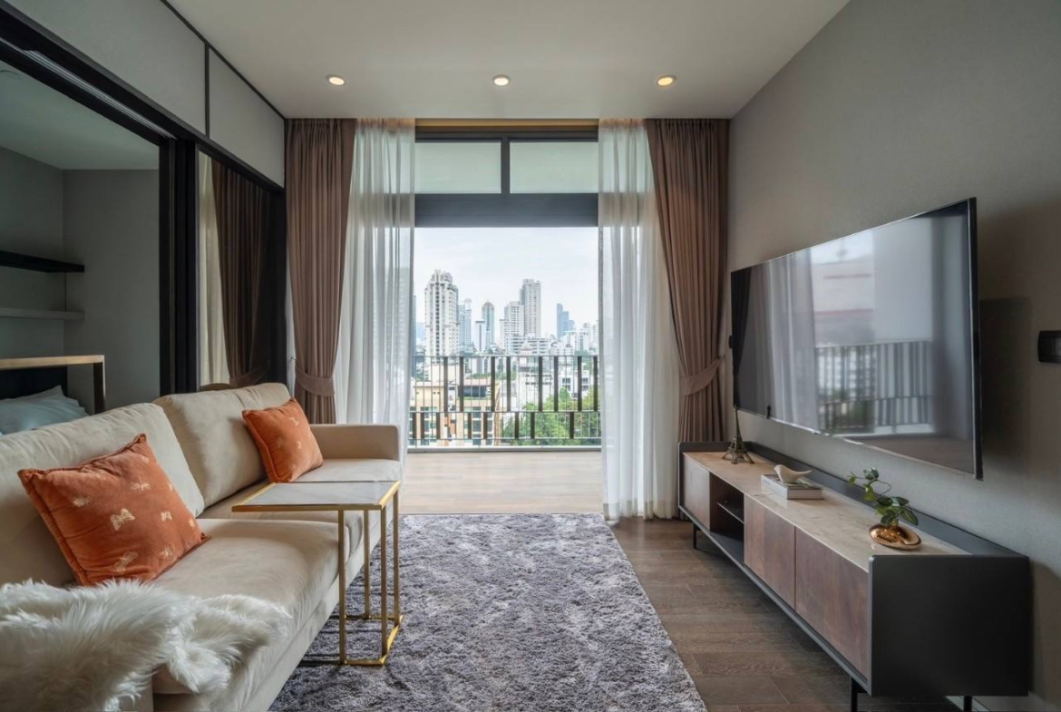 2-bed, 2-bath condo at MUNIQ Sukhumvit 23, 86 sqm. Rent for 95K/month, sale for 22M THB. Fully furnished, near BTS Asok.