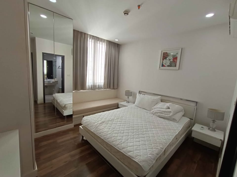 Spacious 2-bedroom, 2-bathroom condo at The Rajdamri, 115 sqm. Rent for 67K/month. Near BTS Chidlom, Central World, and more. Fully furnished.