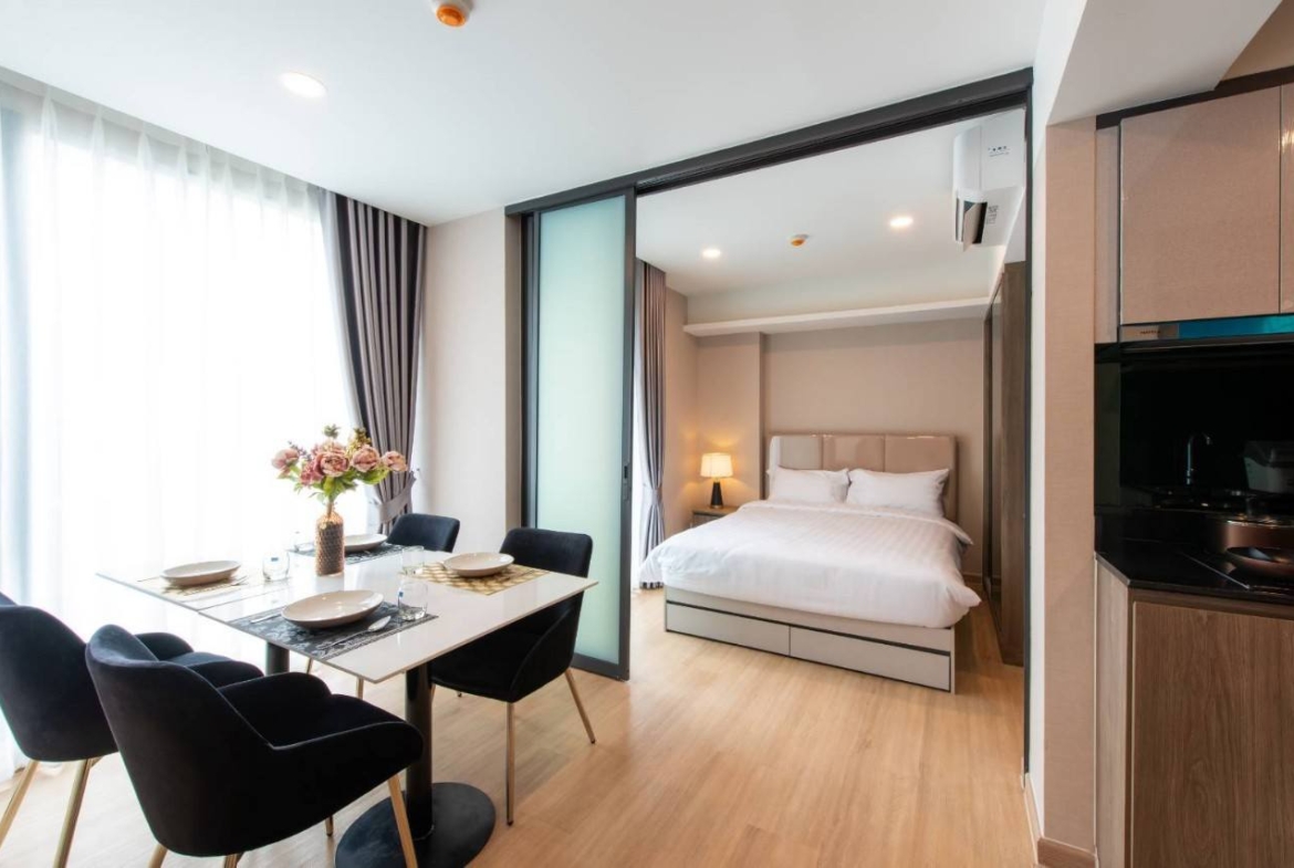 2-bed, 2-bath condo at LLOYD Soonvijai-Thonglor, 54 sqm, for rent starting from 50,000 THB/month. Available Feb 17. Near BTS Thonglor. Fully furnished + free Wi-Fi.