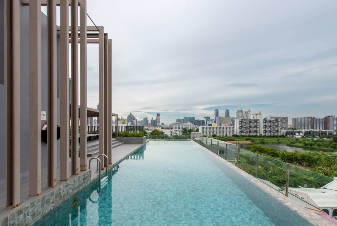 2-bed, 2-bath condo at LLOYD Soonvijai-Thonglor, 54 sqm, for rent starting from 50,000 THB/month. Available Feb 17. Near BTS Thonglor. Fully furnished + free Wi-Fi.