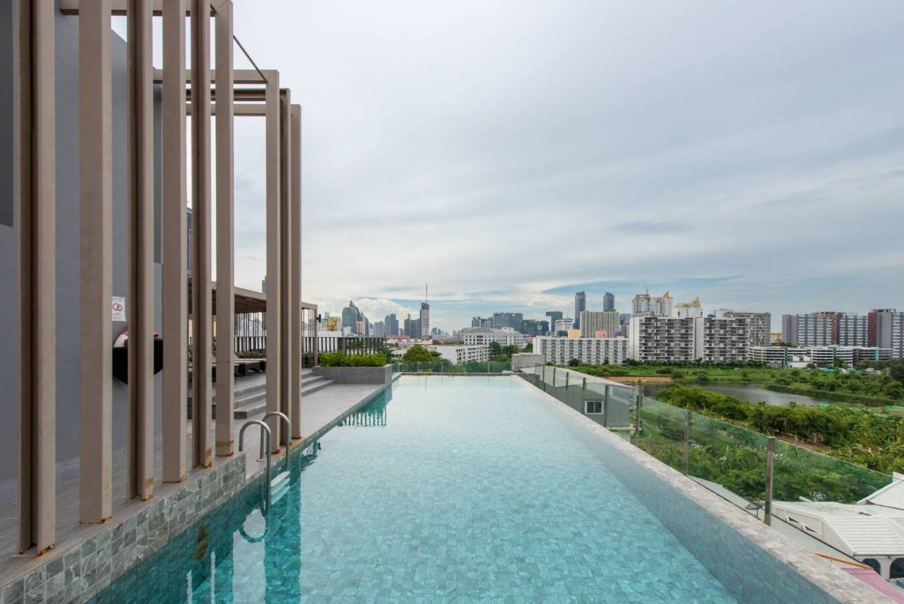 2-bed, 2-bath condo at LLOYD Soonvijai-Thonglor, 54 sqm, for rent starting from 50,000 THB/month. Available Feb 17. Near BTS Thonglor. Fully furnished + free Wi-Fi.