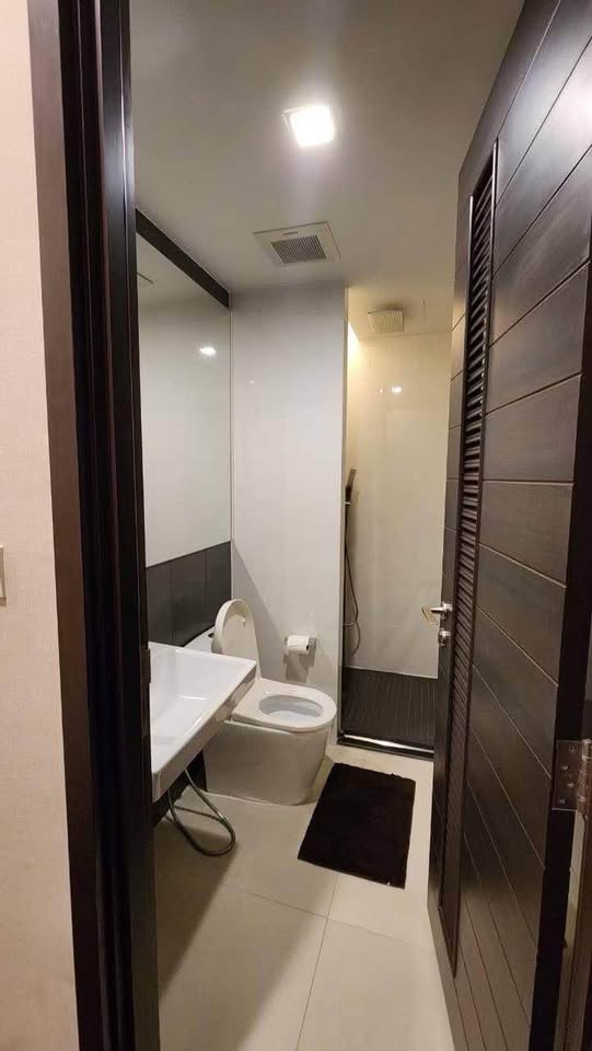 Modern 2-bedrooms, 2-bathrooms condo at Ivy Ampio, 82 sqm, near MRT Cultural Center. Rent 60K/month or Sale 17M. Fully furnished, east-facing views.