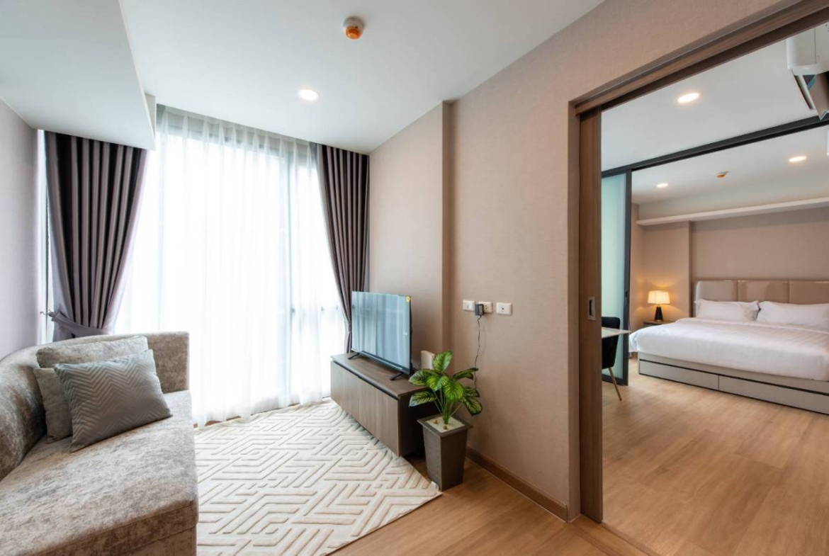 2-bed, 2-bath condo at LLOYD Soonvijai-Thonglor, 54 sqm, for rent starting from 50,000 THB/month. Available Feb 17. Near BTS Thonglor. Fully furnished + free Wi-Fi.