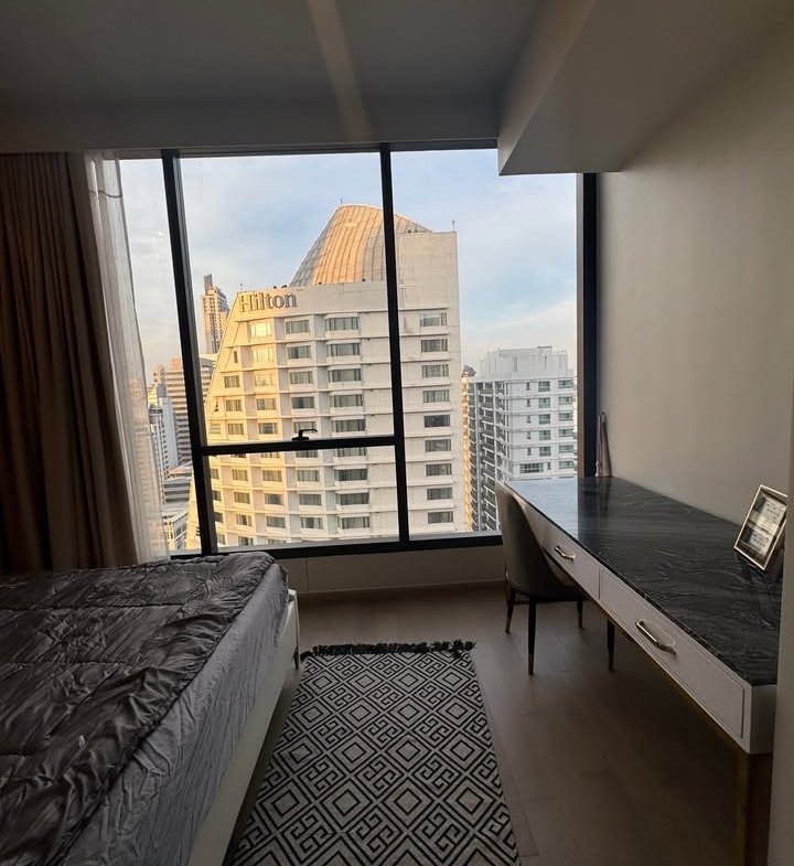 Stylish 2-bedroom, 2-bathroom condo at Celes Asoke, 70 sqm. Rent for 70K/month, near BTS Asok Station. Fully furnished with premium amenities.