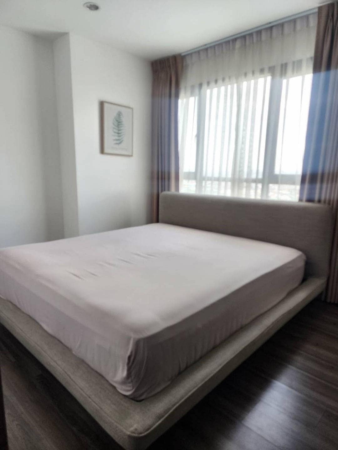Modern 2-BR Condo at The Base Park West Sukhumvit 77, 44.61 sqm, high floor, rent 27,000 THB/month or buy for 7.29M THB. Stunning views, near BTS.