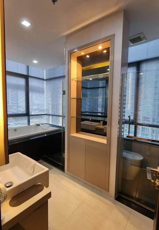 Modern 2-bedrooms, 2-bathrooms condo at Ivy Ampio, 82 sqm, near MRT Cultural Center. Rent 60K/month or Sale 17M. Fully furnished, east-facing views.
