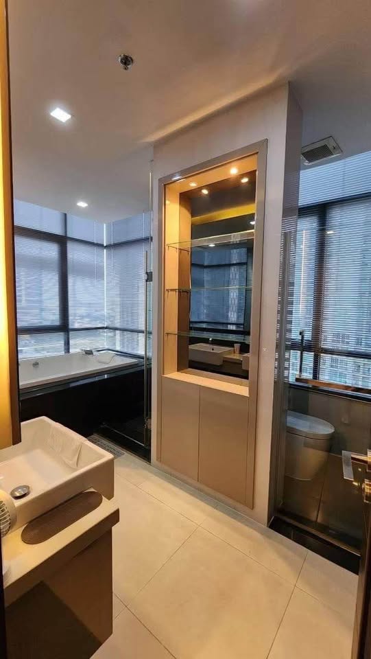 Modern 2-bedrooms, 2-bathrooms condo at Ivy Ampio, 82 sqm, near MRT Cultural Center. Rent 60K/month or Sale 17M. Fully furnished, east-facing views.