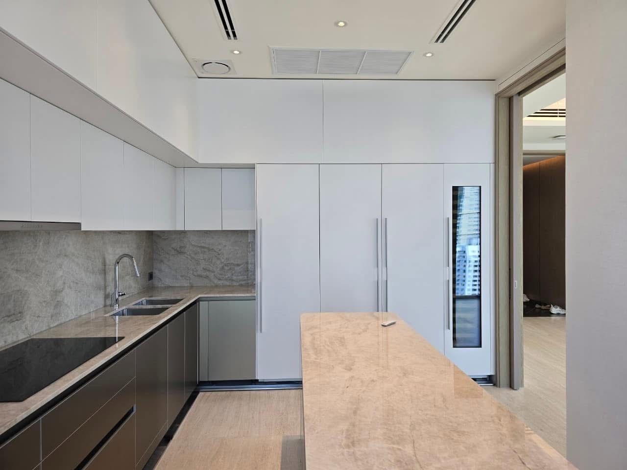 Luxury 3-bed, 3-bath condo at Scope Langsuan, 241 sqm, for rent at 480,000 THB/month. Prime location near BTS Ploenchit, with top-tier amenities and security.