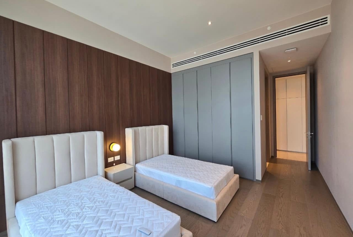 Luxury 3-bed, 3-bath condo at Scope Langsuan, 241 sqm, for rent at 480,000 THB/month. Prime location near BTS Ploenchit, with top-tier amenities and security.
