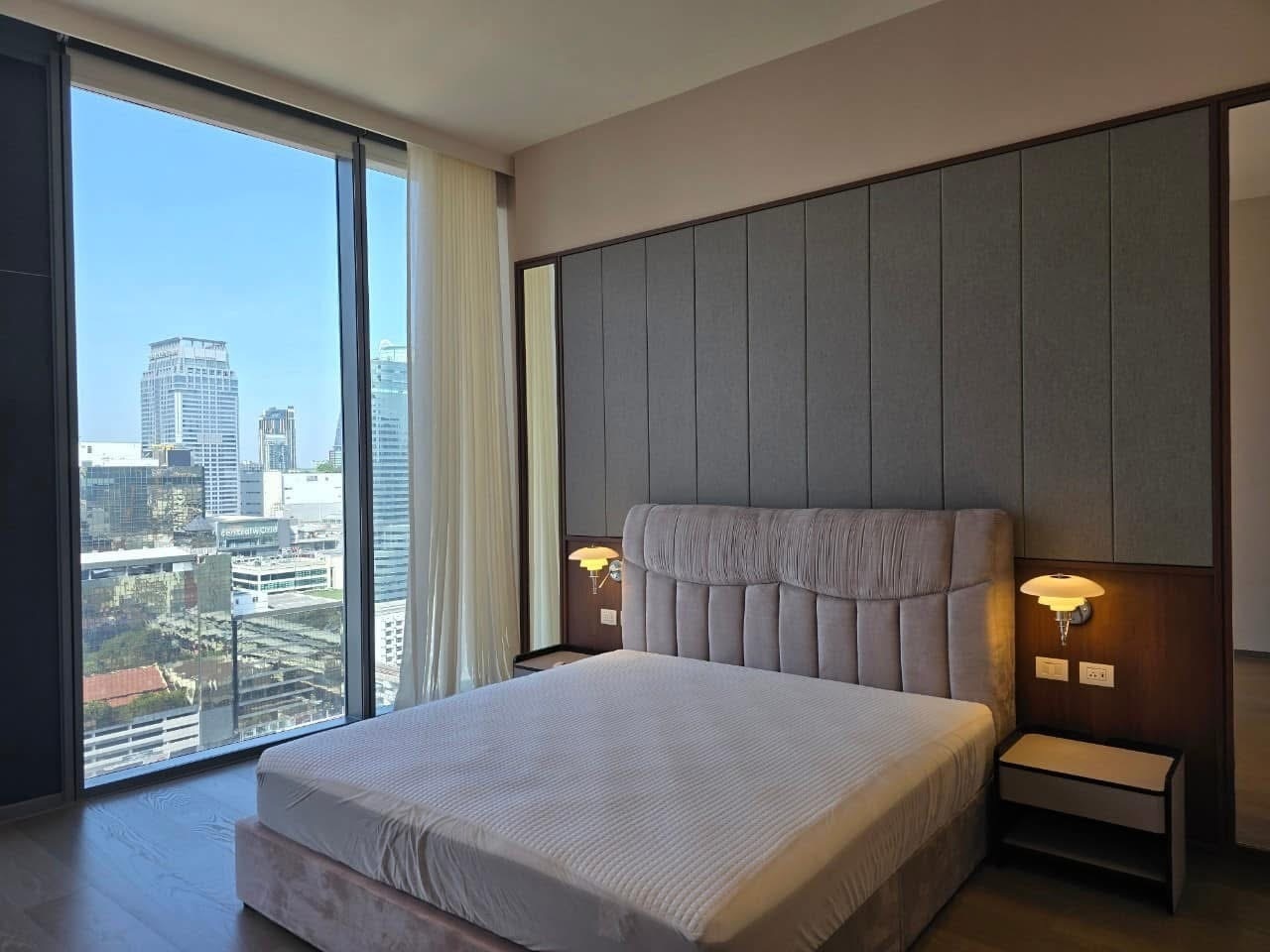 Luxury 3-bed, 3-bath condo at Scope Langsuan, 241 sqm, for rent at 480,000 THB/month. Prime location near BTS Ploenchit, with top-tier amenities and security.