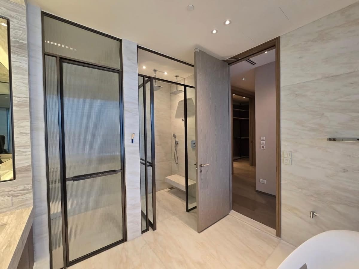Luxury 3-bed, 3-bath condo at Scope Langsuan, 241 sqm, for rent at 480,000 THB/month. Prime location near BTS Ploenchit, with top-tier amenities and security.
