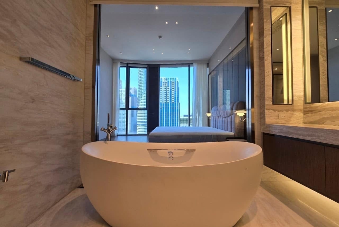 Luxury 3-bed, 3-bath condo at Scope Langsuan, 241 sqm, for rent at 480,000 THB/month. Prime location near BTS Ploenchit, with top-tier amenities and security.