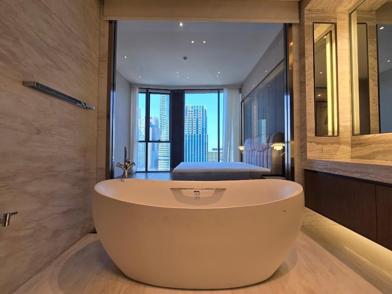 Luxury 3-bed, 3-bath condo at Scope Langsuan, 241 sqm, for rent at 480,000 THB/month. Prime location near BTS Ploenchit, with top-tier amenities and security.