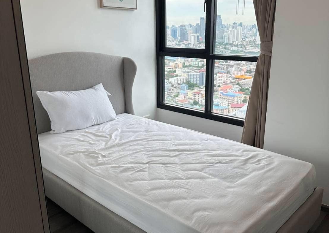 Modern 2-BR Condo at The Base Park West Sukhumvit 77, 44.61 sqm, high floor, rent 27,000 THB/month or buy for 7.29M THB. Stunning views, near BTS.
