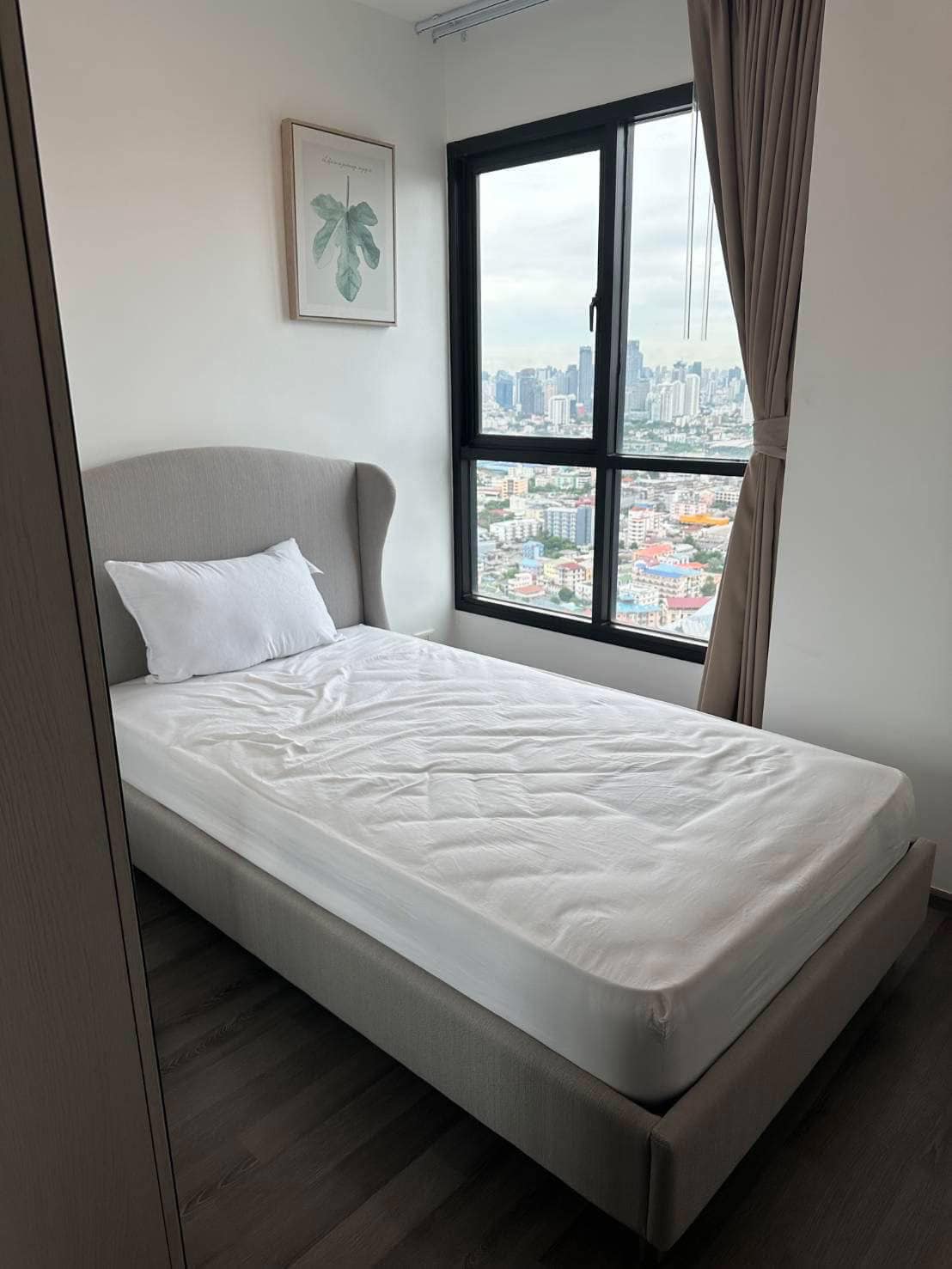 Modern 2-BR Condo at The Base Park West Sukhumvit 77, 44.61 sqm, high floor, rent 27,000 THB/month or buy for 7.29M THB. Stunning views, near BTS.