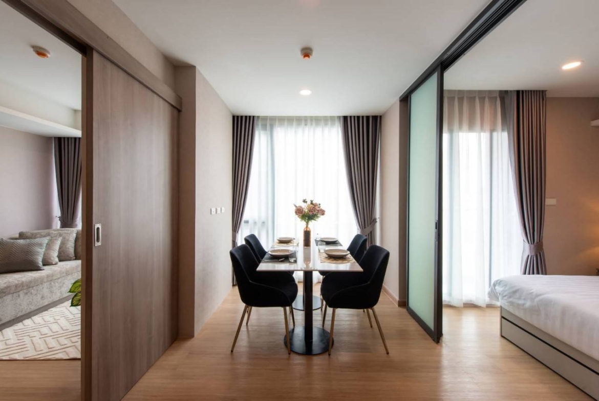 2-bed, 2-bath condo at LLOYD Soonvijai-Thonglor, 54 sqm, for rent starting from 50,000 THB/month. Available Feb 17. Near BTS Thonglor. Fully furnished + free Wi-Fi.