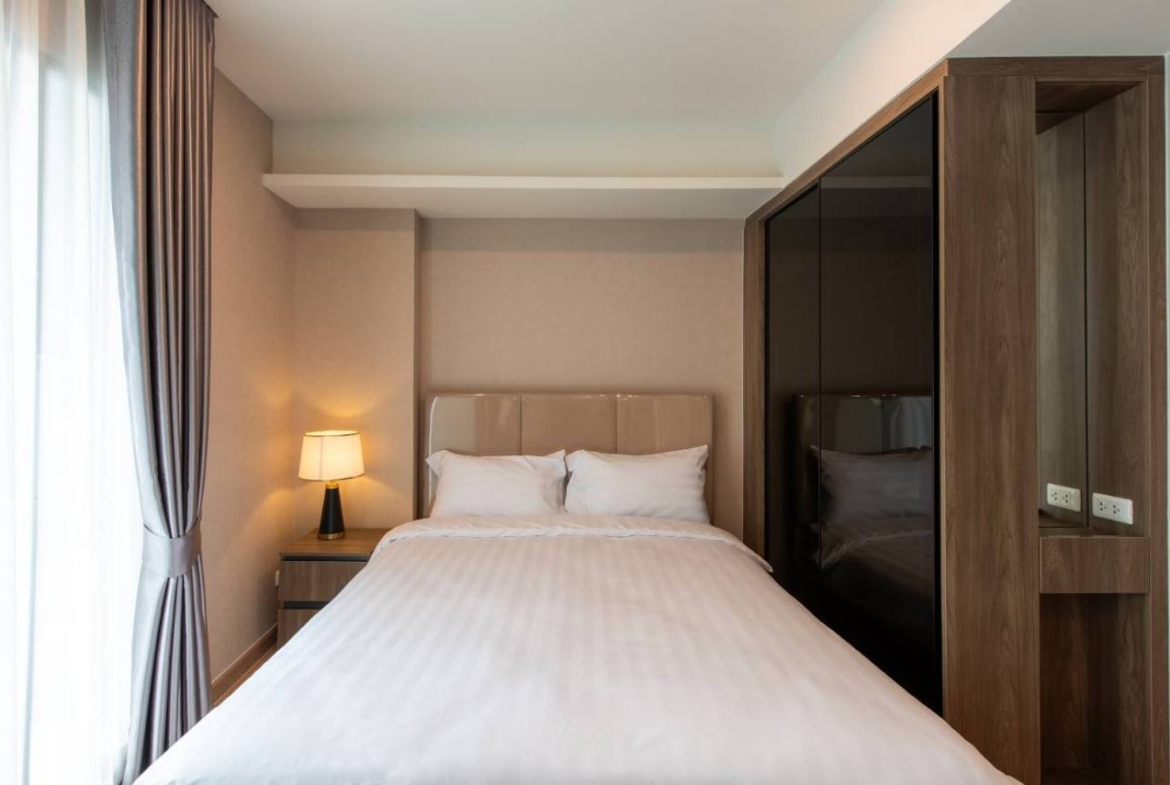 2-bed, 2-bath condo at LLOYD Soonvijai-Thonglor, 54 sqm, for rent starting from 50,000 THB/month. Available Feb 17. Near BTS Thonglor. Fully furnished + free Wi-Fi.