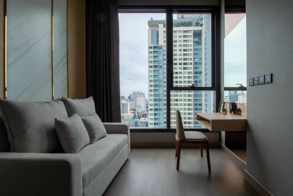 Luxury 2-Bedroom, 2-Bathroom, 77 sqm condo at The Esse at Singha Complex for rent ฿75,000/month. High floor, skyline view, fully furnished, MRT Phetchaburi.