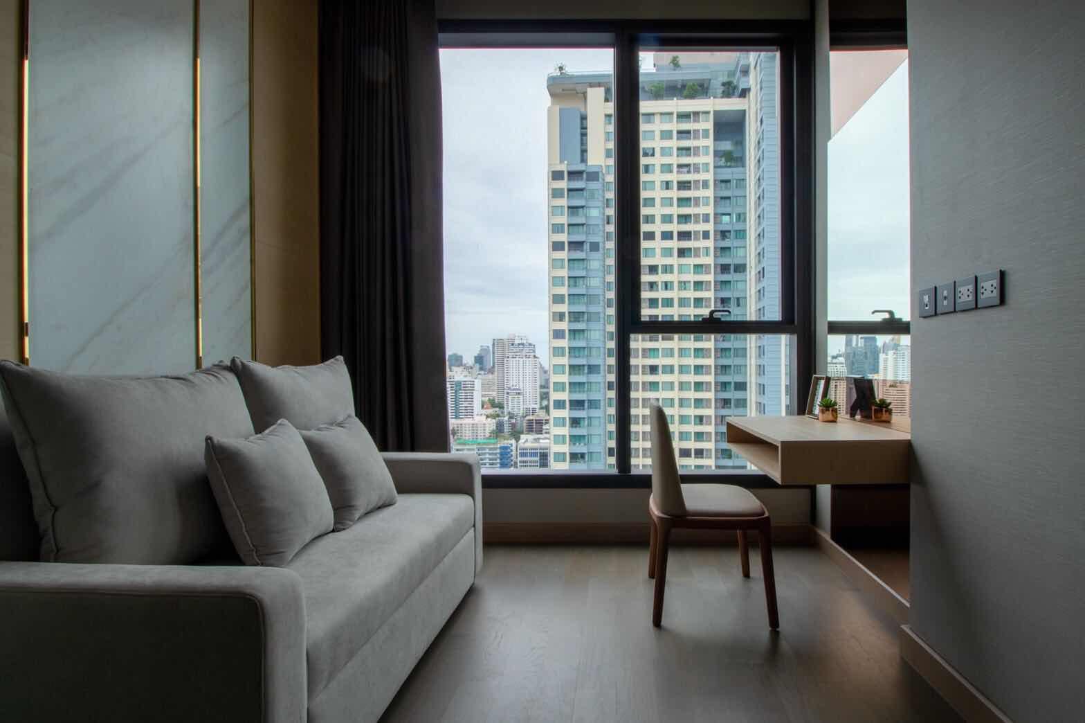 Luxury 2-Bedroom, 2-Bathroom, 77 sqm condo at The Esse at Singha Complex for rent ฿75,000/month. High floor, skyline view, fully furnished, MRT Phetchaburi.