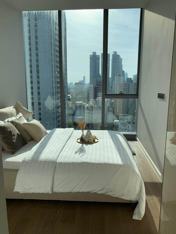 Luxury 2-bed, 2-bath, 110 sqm condo at Kraam Sukhumvit 26, for sale at 36,000,000 THB. High floor, unblocked view, near BTS Phrom Phong. Contact us today!