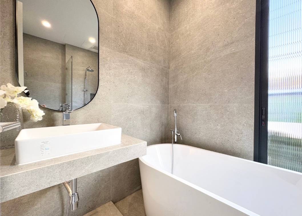 Rent this spacious 4-bedroom, 4-bathroom townhouse in Pridi Panomyong 42. 250 sqm with modern design and private garden. Available for 110,000 THB/month
