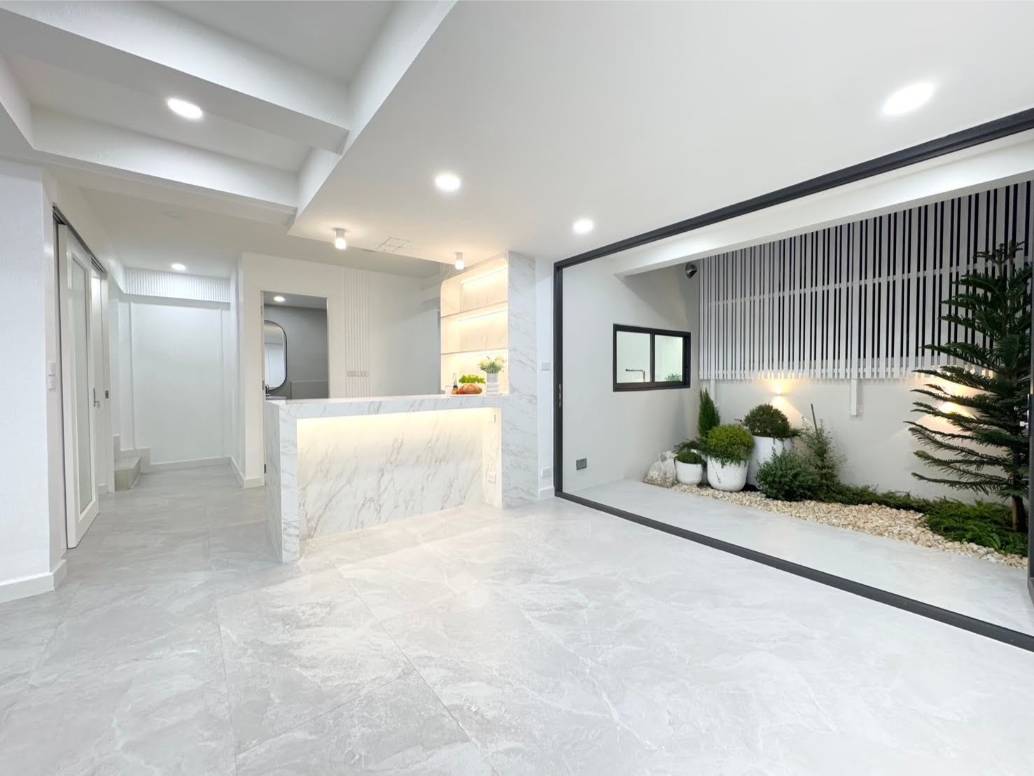 Rent this spacious 4-bedroom, 4-bathroom townhouse in Pridi Panomyong 42. 250 sqm with modern design and private garden. Available for 110,000 THB/month