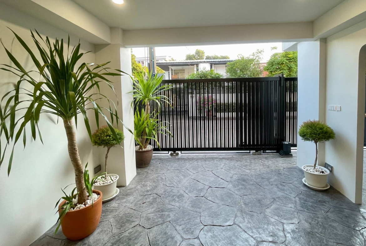 Rent this spacious 4-bedroom, 4-bathroom townhouse in Pridi Panomyong 42. 250 sqm with modern design and private garden. Available for 110,000 THB/month