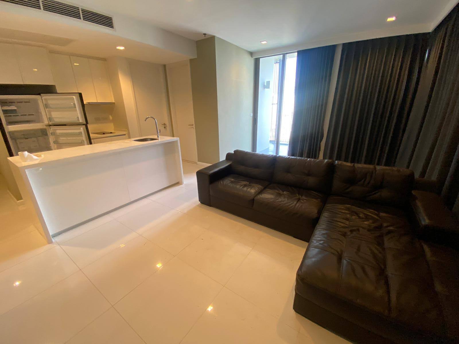 Spacious 2-bed, 2-bath corner unit at Nara 9, 78 sqm, for rent at 50,000 THB/month. Newly renovated with TV & coffee table. Close to Chong Nonsi BTS.