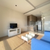 Elegant 1-bedroom condo at Circle Living Prototype with modern furnishings, high-floor city views, and eco-friendly smart home features in Bangkok.