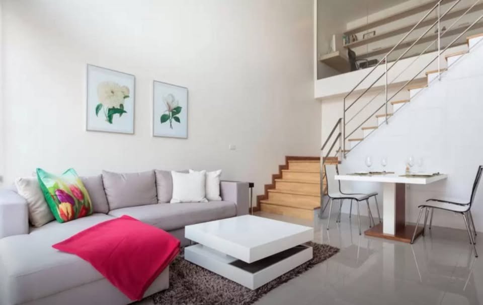 Luxurious 2-bedroom duplex at Downtown 49 in Sukhumvit 49, featuring modern interiors, spacious living areas, and a pet-friendly environment with top-tier facilities.