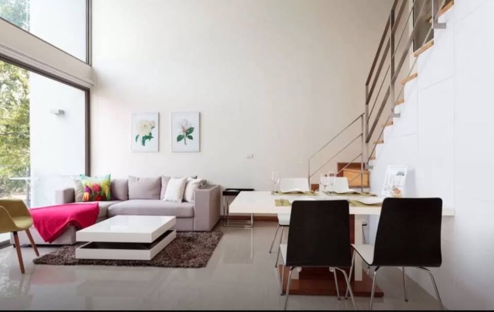 Luxurious 2-bedroom duplex at Downtown 49 in Sukhumvit 49, featuring modern interiors, spacious living areas, and a pet-friendly environment with top-tier facilities.