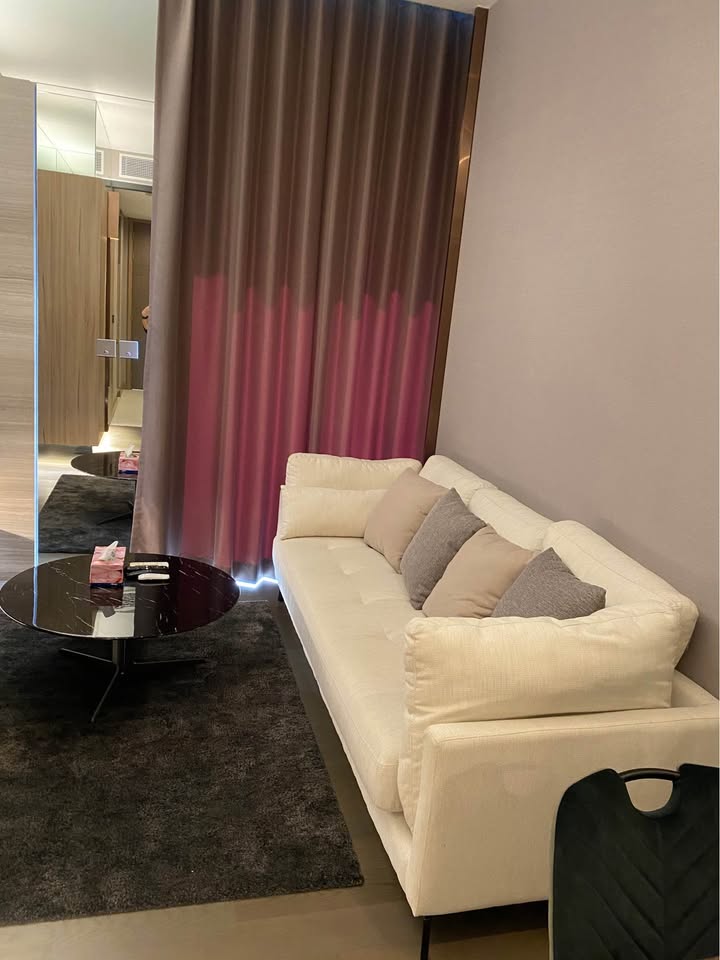 Luxury 1-bedroom apartment at The Esse at Singha Complex, 29th floor, 48 sqm. For rent at 42,000 THB/month or sale at 13.5M THB. Prime Asoke location.