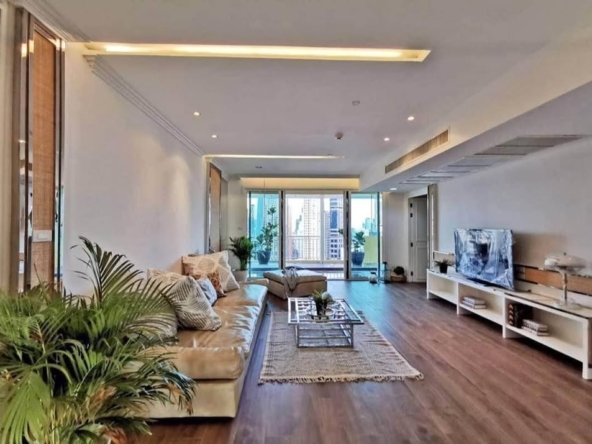 Spacious 4-bedroom penthouse at Wilshire Condominium, featuring modern interiors, skyline views, private balcony, and high-end amenities in Sukhumvit 22, Bangkok.