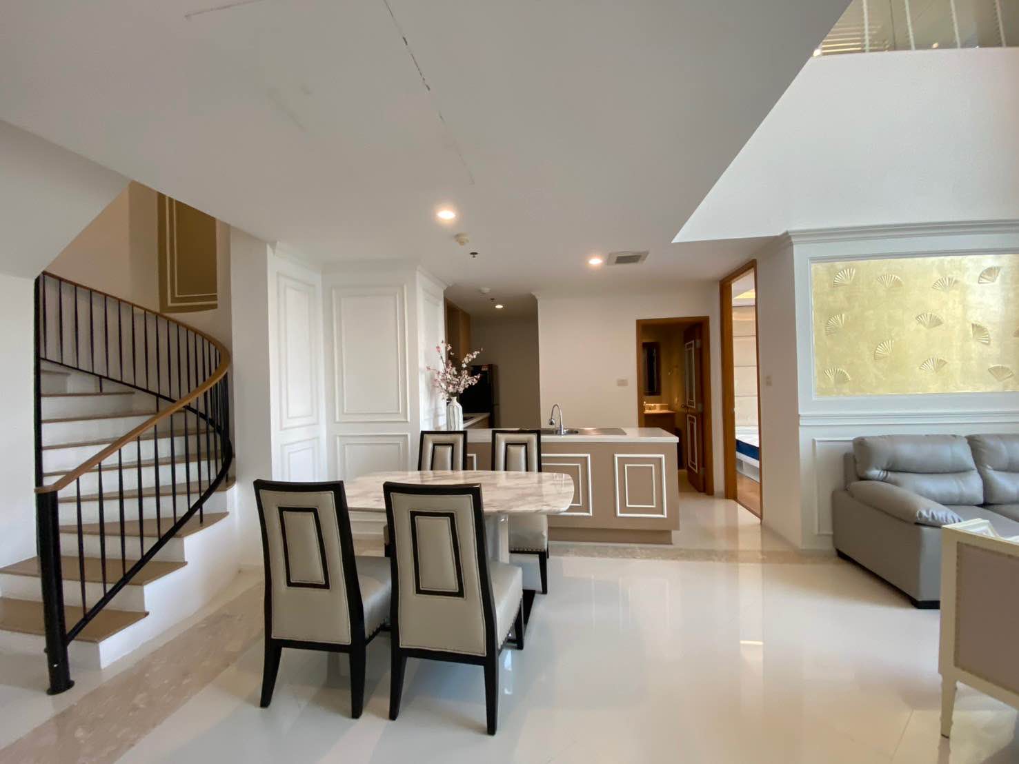 Luxury duplex 2-bed, 2-bath 120 sqm condo at The Empire Place, Sathorn. Pet-friendly, near BTS Chong Nonsi. For rent at ฿60,000/month. Contact us today!