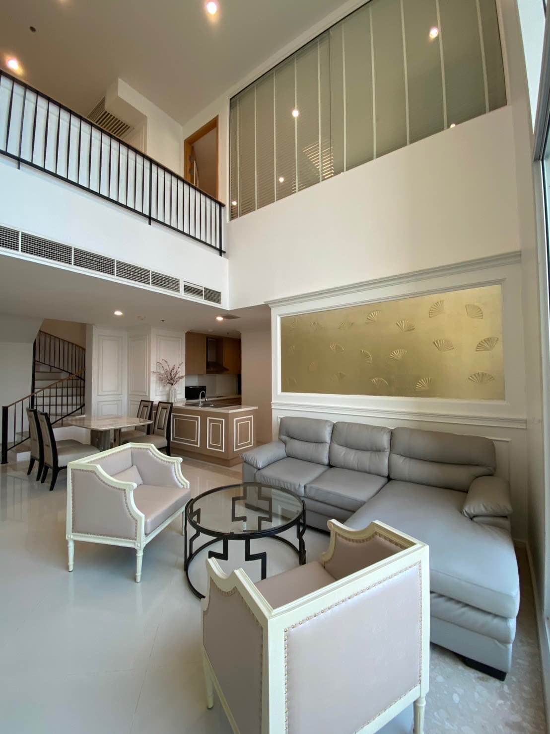 Luxury duplex 2-bed, 2-bath 120 sqm condo at The Empire Place, Sathorn. Pet-friendly, near BTS Chong Nonsi. For rent at ฿60,000/month. Contact us today!