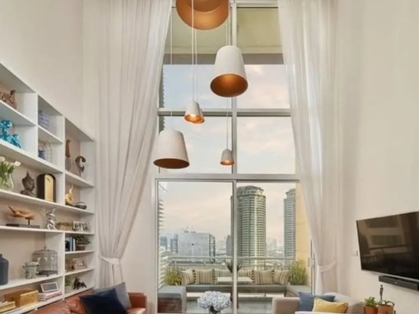 2-bed 2-bath 108 sqm duplex condo in Sathorn for sale at 19.25M THB. Open view, prime location, near BTS, well-maintained building with top amenities.