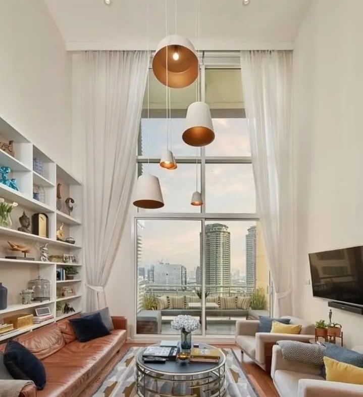 2-bed 2-bath 108 sqm duplex condo in Sathorn for sale at 19.25M THB. Open view, prime location, near BTS, well-maintained building with top amenities.