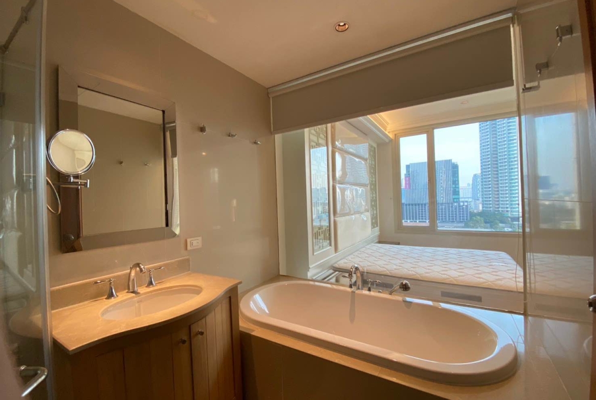 Luxury duplex 2-bed, 2-bath 120 sqm condo at The Empire Place, Sathorn. Pet-friendly, near BTS Chong Nonsi. For rent at ฿60,000/month. Contact us today!