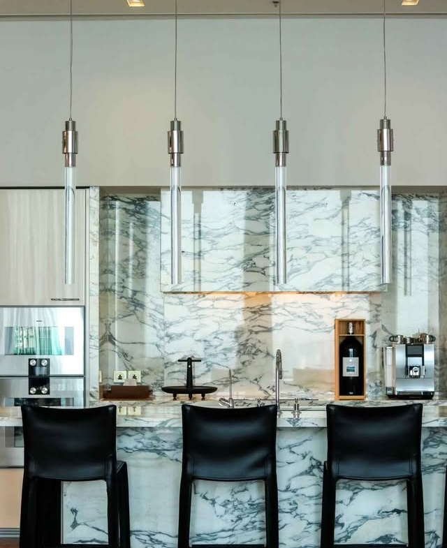 Exclusive 4-bed Sky Residence at The Ritz-Carlton, MahaNakhon. 409 sqm, 55+ floor. 5-star luxury, premium services, top-tier amenities. Price: 258M THB.